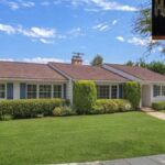 Exterior view of a luxury home in Pacific Palisades from Adam Sandler's real estate portfolio