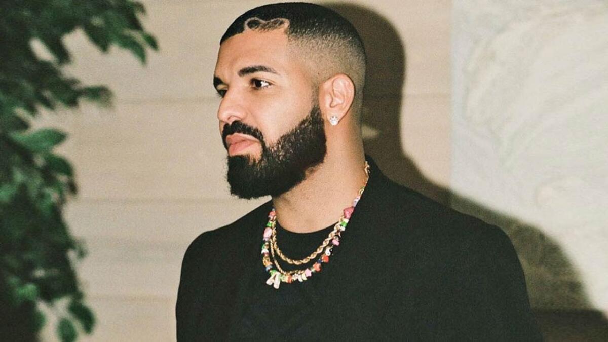 Drake Net Worth highlighting music royalties, OVO brand, real estate, and business ventures