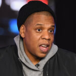 Jay-Z Brand at show highlighting his music, business empire, and cultural influence on stage