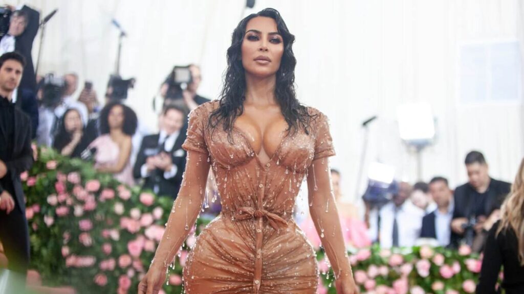 Kim Kardashian speaking at a criminal justice reform event, representing her influence beyond beauty and fashion.
