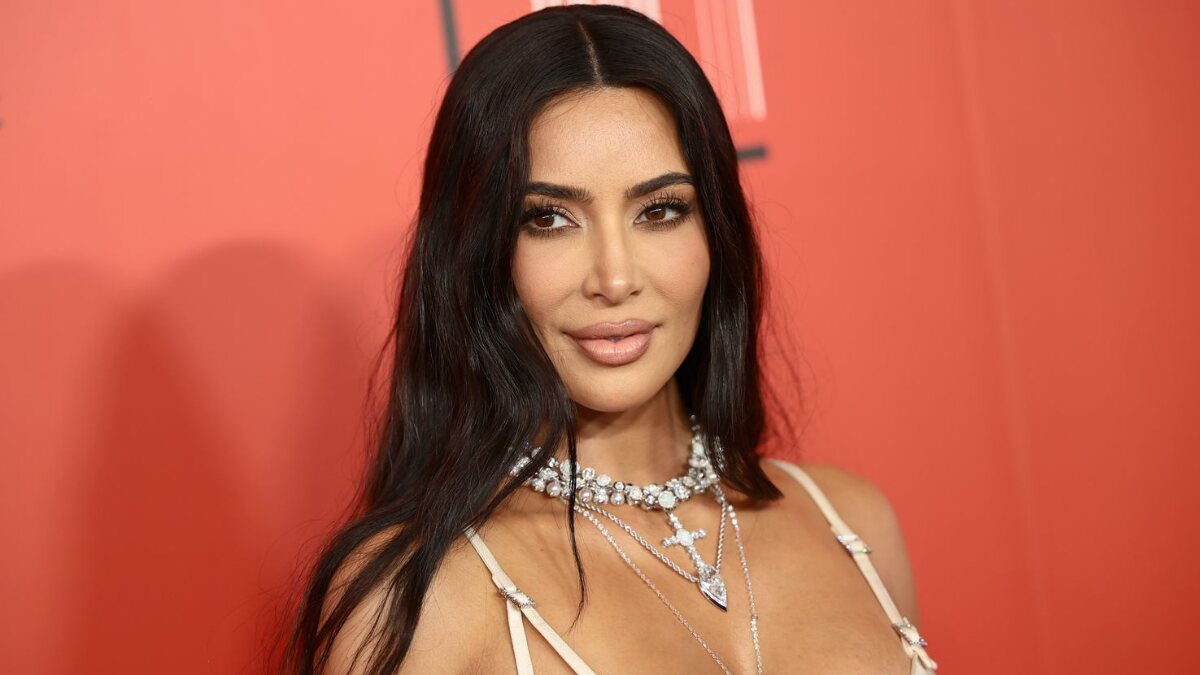 Kim Kardashian in a professional setting, symbolizing her billion-dollar empire and Kim Kardashian brand value