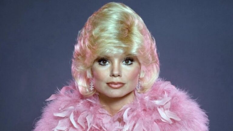 Actress Loni Anderson posing at a Hollywood event, representing her career longevity and net worth