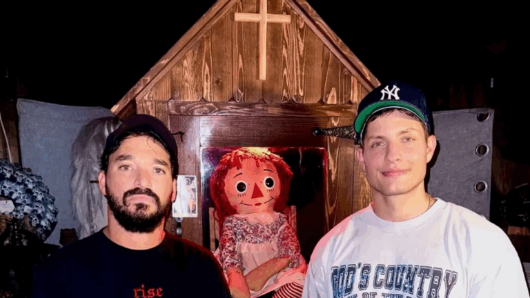 Matt Rife standing in the Annabelle Doll House he recently purchased, blending comedy with paranormal branding.