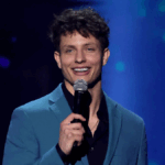 Matt Rife performing live on stage, reflecting his rising net worth in the comedy industry