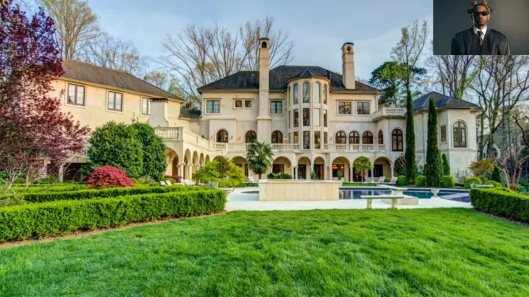 Offset Atlanta Mansion exterior view of the $5.8M luxury estate with grand driveway and landscaped grounds