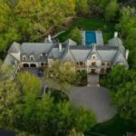 Travis Kelce real estate portfolio featuring his Kansas City mansion and luxury property investments