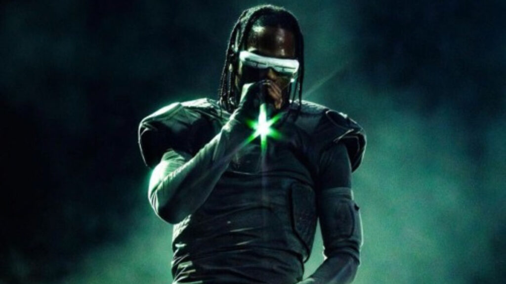 Travis Scott performing on stage amid chaotic lighting and a raging crowd, embodying the Archetype of the Anti-Hero with intense energy and rebellious stage presence.