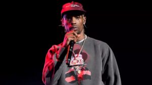 Travis Scott performing live during his Astroworld Tour, symbolizing his rise and reinvention as a global music icon.