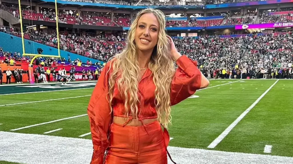 Brittany Mahomes Fashion showcasing stylish game-day outfit with Kansas City Chiefs colors