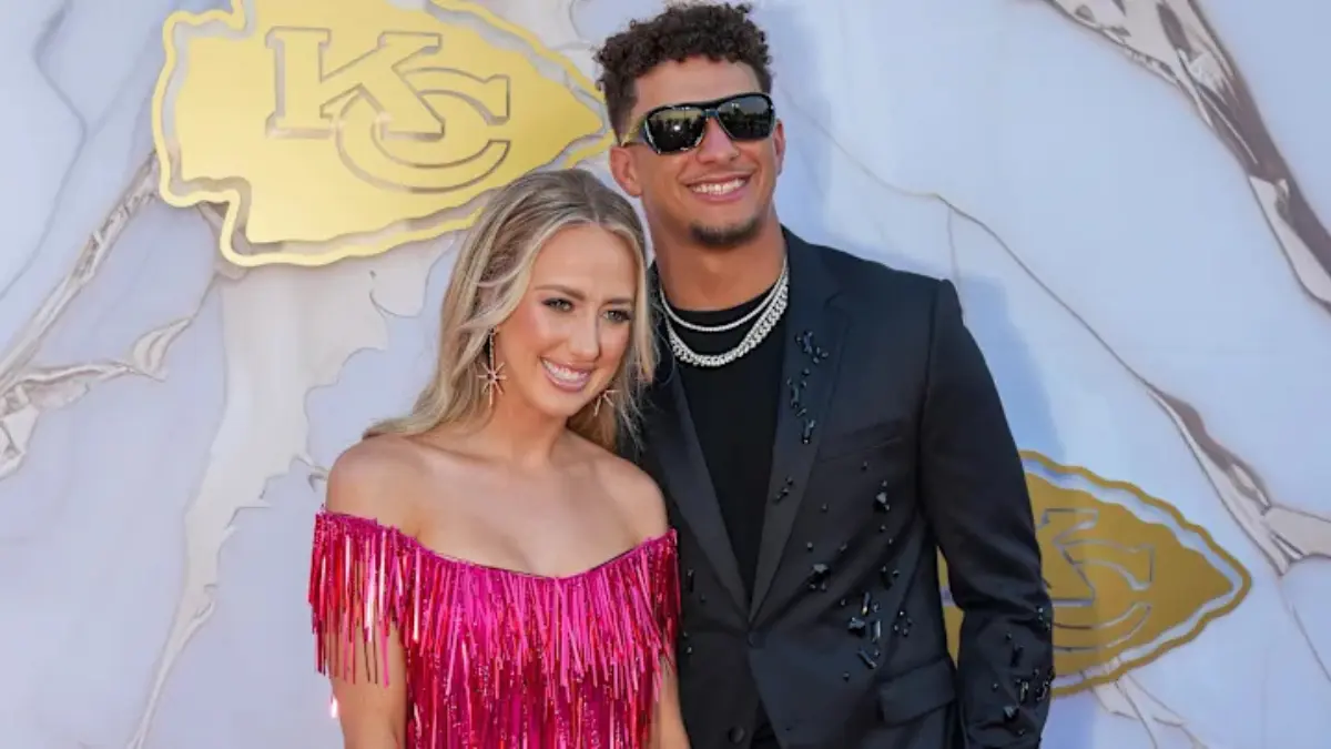 Brittany Mahomes and Patrick Mahomes together at a Kansas City Chiefs game, highlighting their role as a modern NFL power couple.