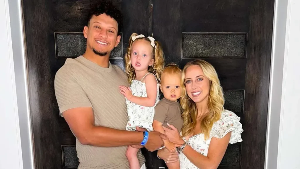 Family photo of Brittany Mahomes and Patrick Mahomes with their children Sterling and Bronze.