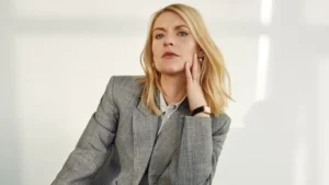 Claire Danes showcasing her iconic fashion style on the red carpet, from minimalistic looks to couture gowns, reflecting her evolution as a Hollywood style icon.