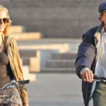 Erin Heatherton and Leonardo DiCaprio on cycle during 2012 outing in New York City, photographed together as a celebrity couple.