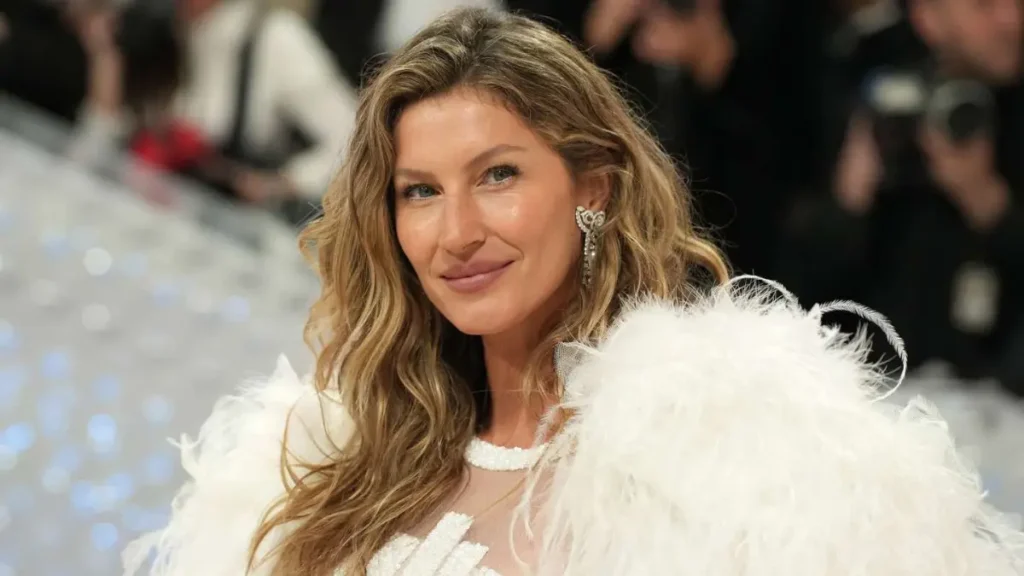 Gisele Bündchen showcasing her iconic fashion choices, blending Brazilian minimalism with high-end couture, wearing sustainable luxury brands like Stella McCartney and Chanel.