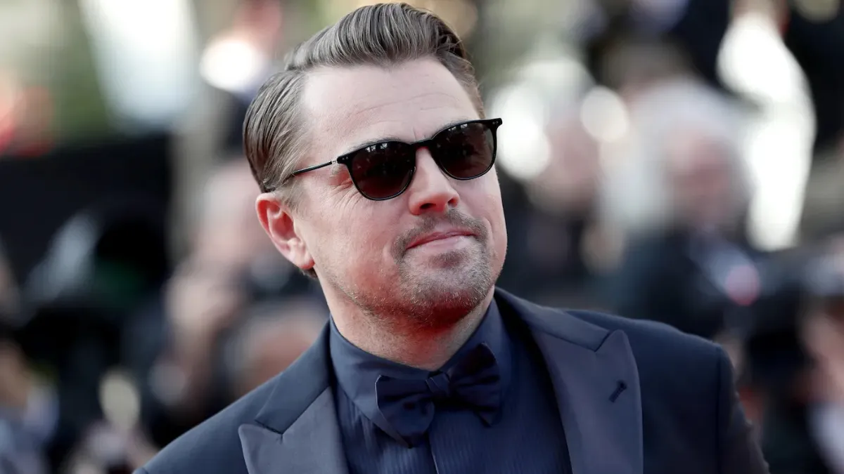 Leonardo DiCaprio style featuring classic black tuxedo and modern tailored fit on the red carpet