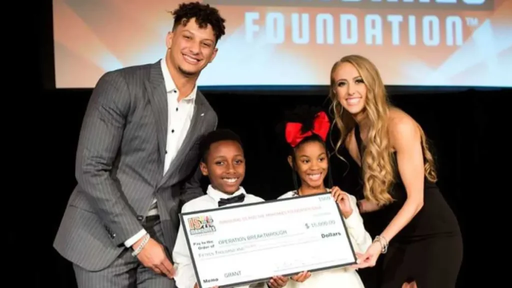 Patrick Mahomes charity work with 15 and the Mahomies Foundation supporting children and Kansas City community programs
