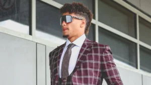 Patrick Mahomes Style showcasing his signature mix of luxury suits and sporty casual looks, highlighting his evolution as an NFL fashion icon.