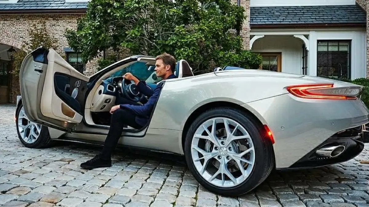 Tom Brady cars collection featuring Bugatti Veyron, Aston Martin, Rolls-Royce, and Cadillac Escalade