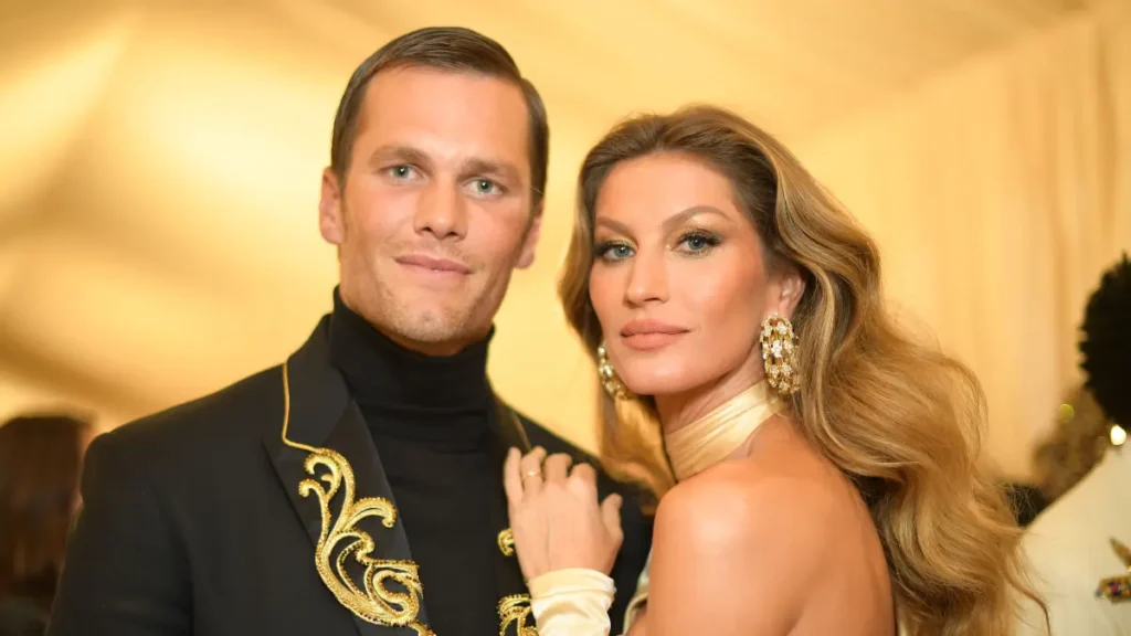 Tom Brady and Gisele Bündchen at the Met Gala, showcasing their iconic celebrity couple style and power partnership.