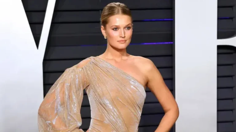 Toni Garrn Biography – German supermodel posing on the runway, highlighting her international modeling career and philanthropic journey.