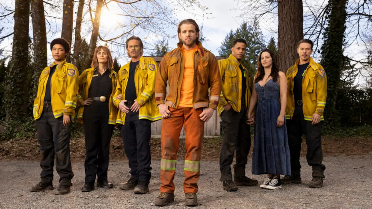 Full Fire Country Season 4 cast portrait with engines and CAL FIRE badges visible