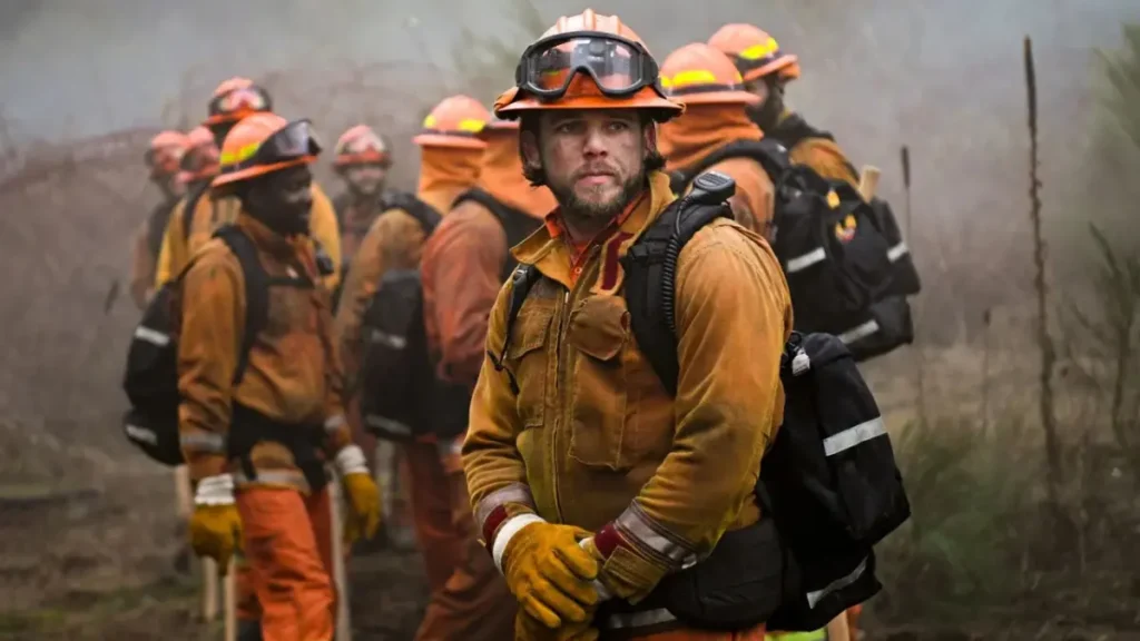 Max Thieriot as Bode Leone in turnout gear, soot-streaked after a wildfire rescue, Season 4