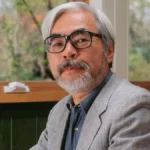 Hayao Miyazaki smiling during a Studio Ghibli interview