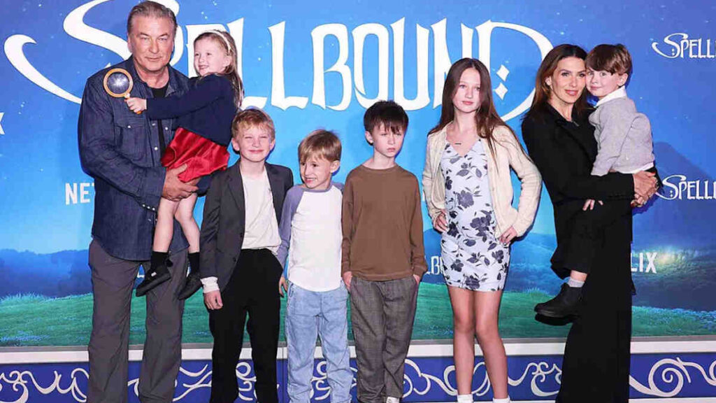 Hilaria Baldwin with her seven kids in a smiling group portrait