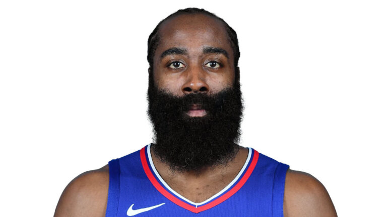 Close-up of James Harden with his signature beard, wearing a team jersey, looking directly at the camera.