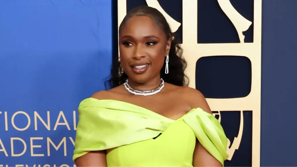 Jennifer Hudson stuns in a neon yellow off-the-shoulder gown on the 2025 Daytime Emmy Awards red carpet.